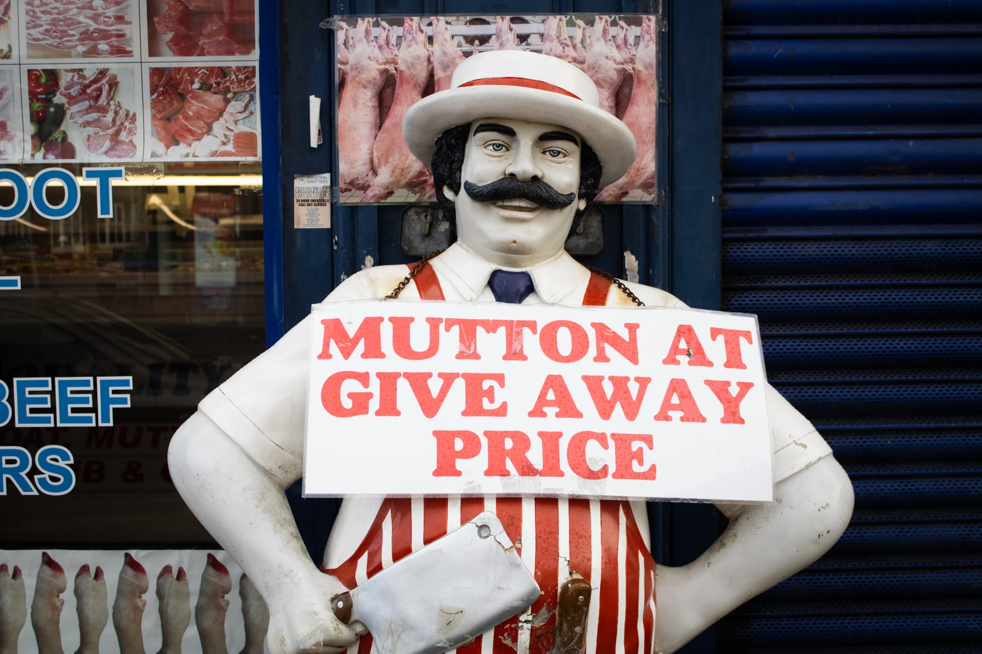 A butcher statue outside Quality Halal Meat. Photo: Jack Dulhanty/The Mill.